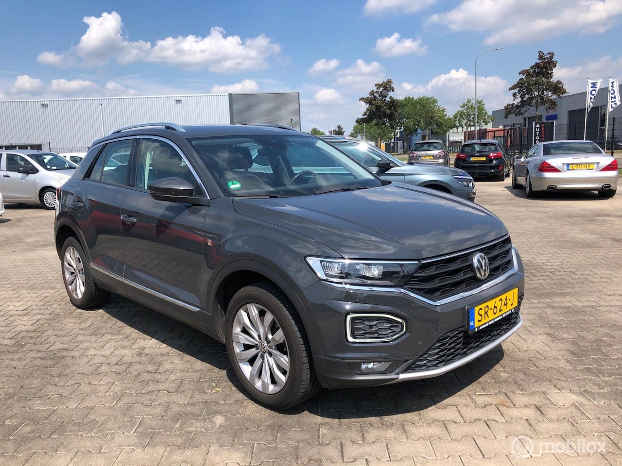 Volkswagen T-Roc - 1.5 TSI SPORT AIRCO ECC CRUISE TRH LED - AutoWereld.nl