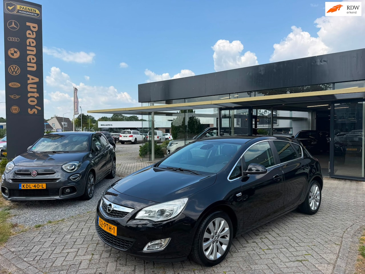 Opel Astra - 1.4 Turbo Cosmo 1.4 Turbo Cosmo, cruise, airco, ingebouwd fietsrek! - AutoWereld.nl