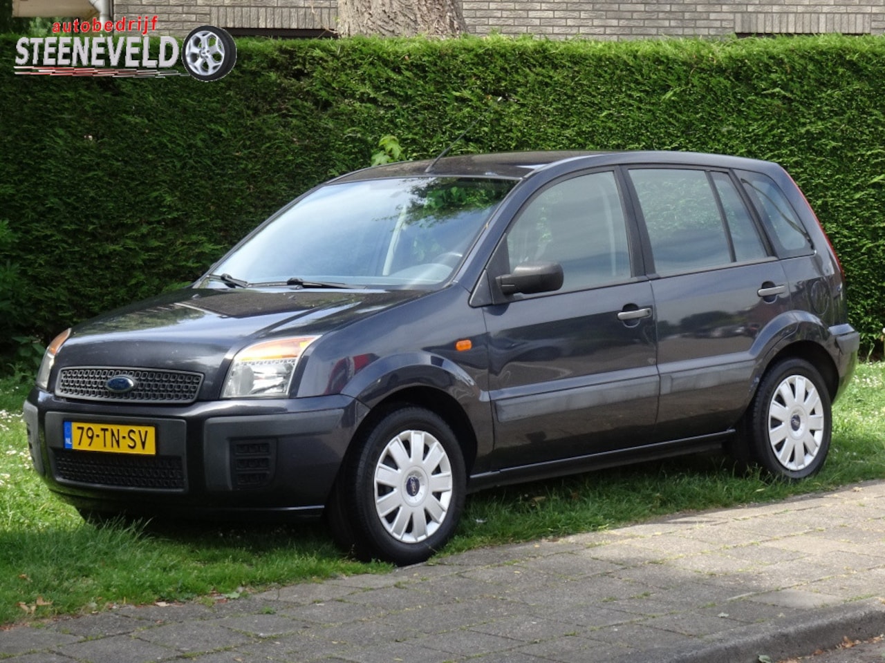 Ford Fusion - 1.4 Champion met Airco en Trekhaak - AutoWereld.nl