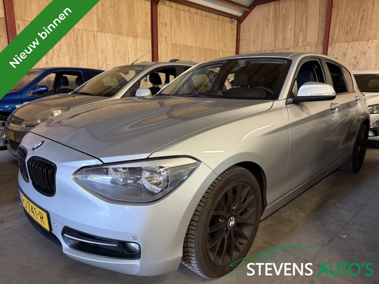BMW 1-serie - 118i 170PK SPORTSTOELEN / NAVI / CLIMA / CRUISE / PDC - AutoWereld.nl