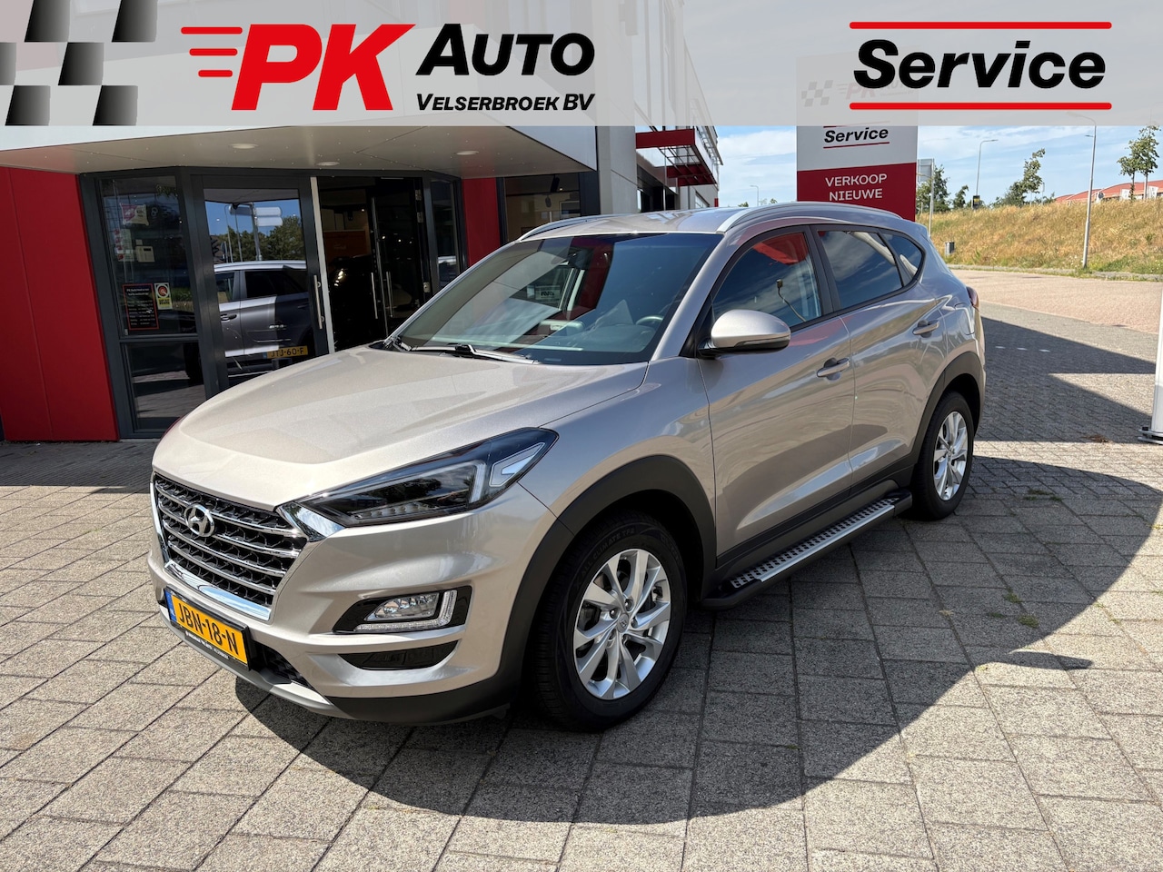 Hyundai Tucson - 1.6 T-GDI Comfort | Navi | Trekhaak | Cruise | 51.721 km Dealeronderhouden - AutoWereld.nl
