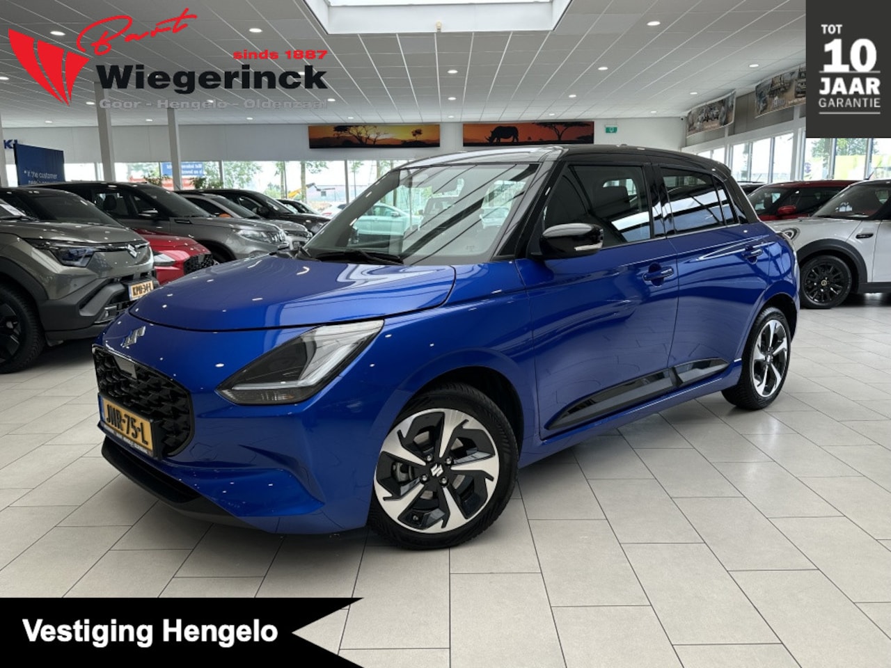 Suzuki Swift - 1.2 Style SmartHybrid [AUTOMAAT| CARPLAY| CLIMA| CAMERA]. - AutoWereld.nl