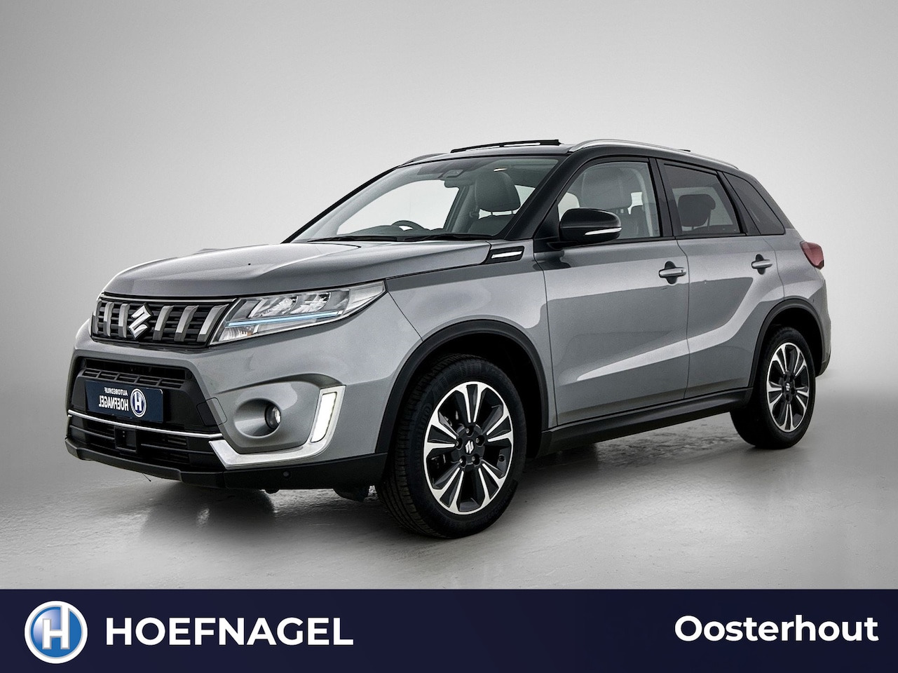 Suzuki Vitara - 1.4 Boosterjet Comfort Smart Hybrid | Adaptive Cruise | Stoelverwarming | Navigatie | Came - AutoWereld.nl