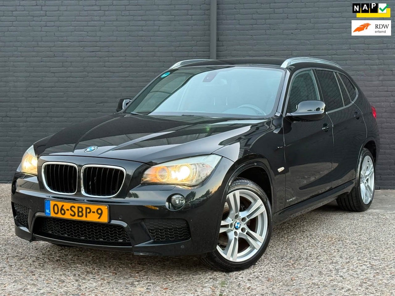 BMW X1 - SDrive18i M SPORTPAKKET|NAVI|AIRCO|PDC|TREKHAAK|ELEK RAMEN | NWE APK - AutoWereld.nl