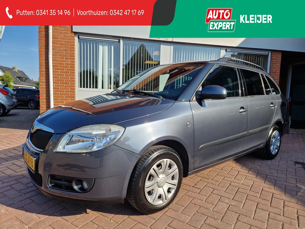 Skoda Fabia Combi - 1.4 16V 63KW Tour Trekhaak - AutoWereld.nl