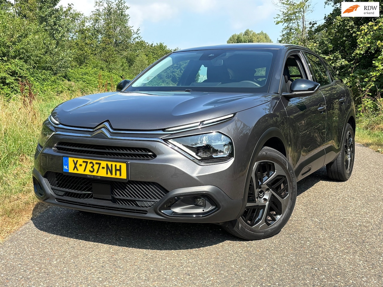 Citroën C4 - 1.2 Puretech Shine Aut/Camera/Navi/Clima - AutoWereld.nl