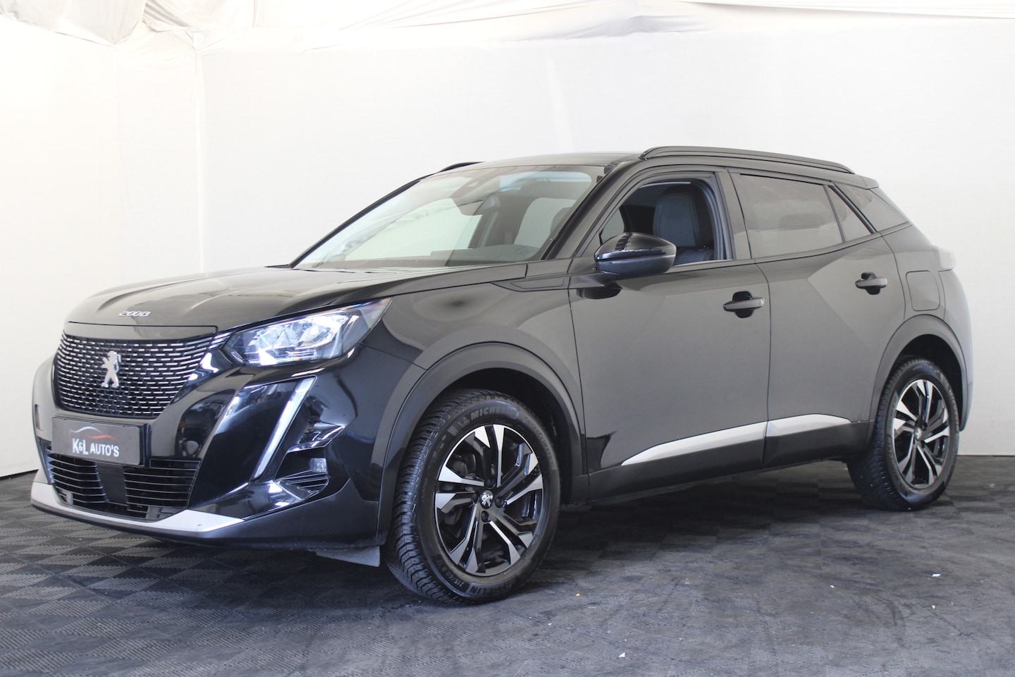 Peugeot 2008 - 1.2 PureTech Allure Pack |Navi|Camera| - AutoWereld.nl
