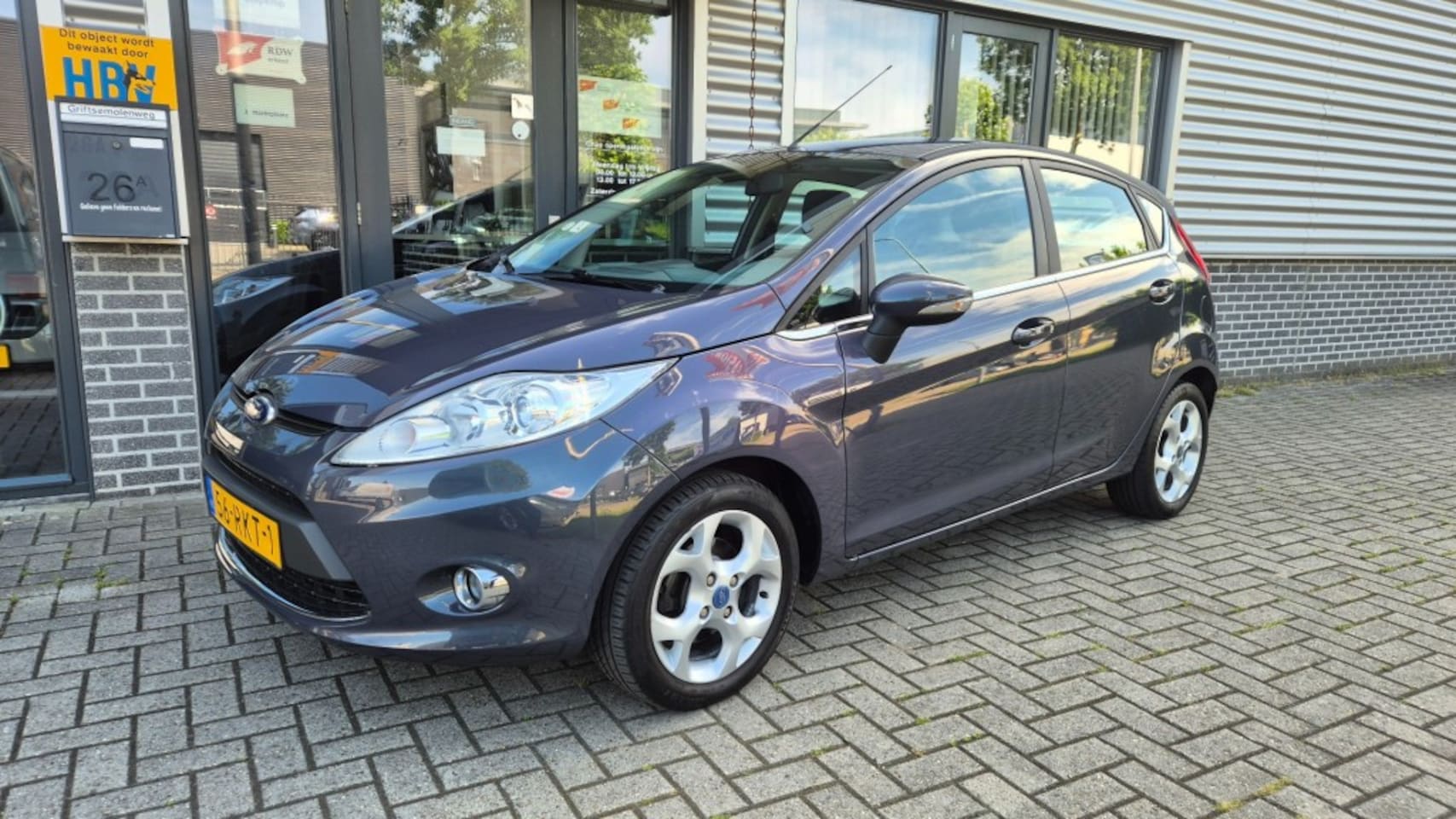 Ford Fiesta - 1.25 Titanium AIRCO PDC EL RAMEN CENTR VERG AFST NAP - AutoWereld.nl