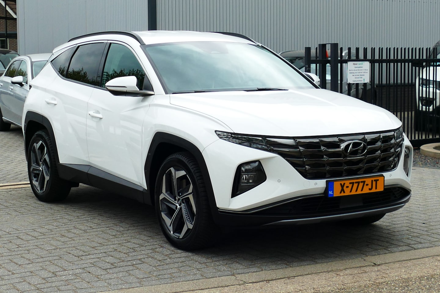 Hyundai Tucson - 1.6 T-GDI HEV Premium. Adap Cruise, Camera, Leer, Stoel&StuurVerw, 19"LMV - AutoWereld.nl