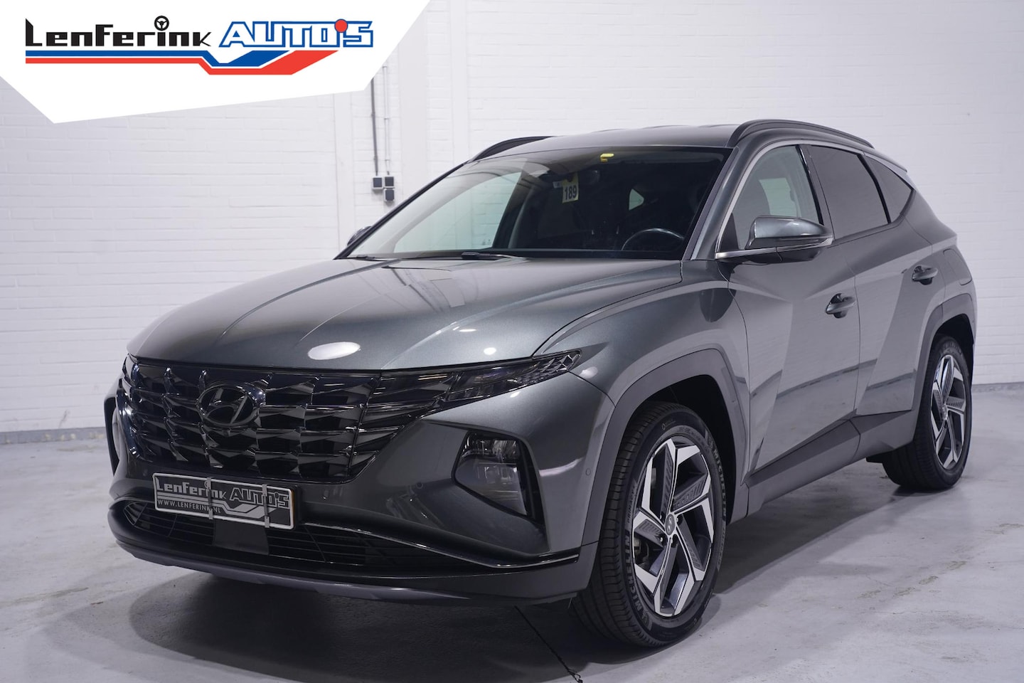 Hyundai Tucson - 1.6 T-GDI HEV Premium 1e eign. NAP Navigatie DAB ACC ECC Bleutooth stoel/stuur verwarming/ - AutoWereld.nl