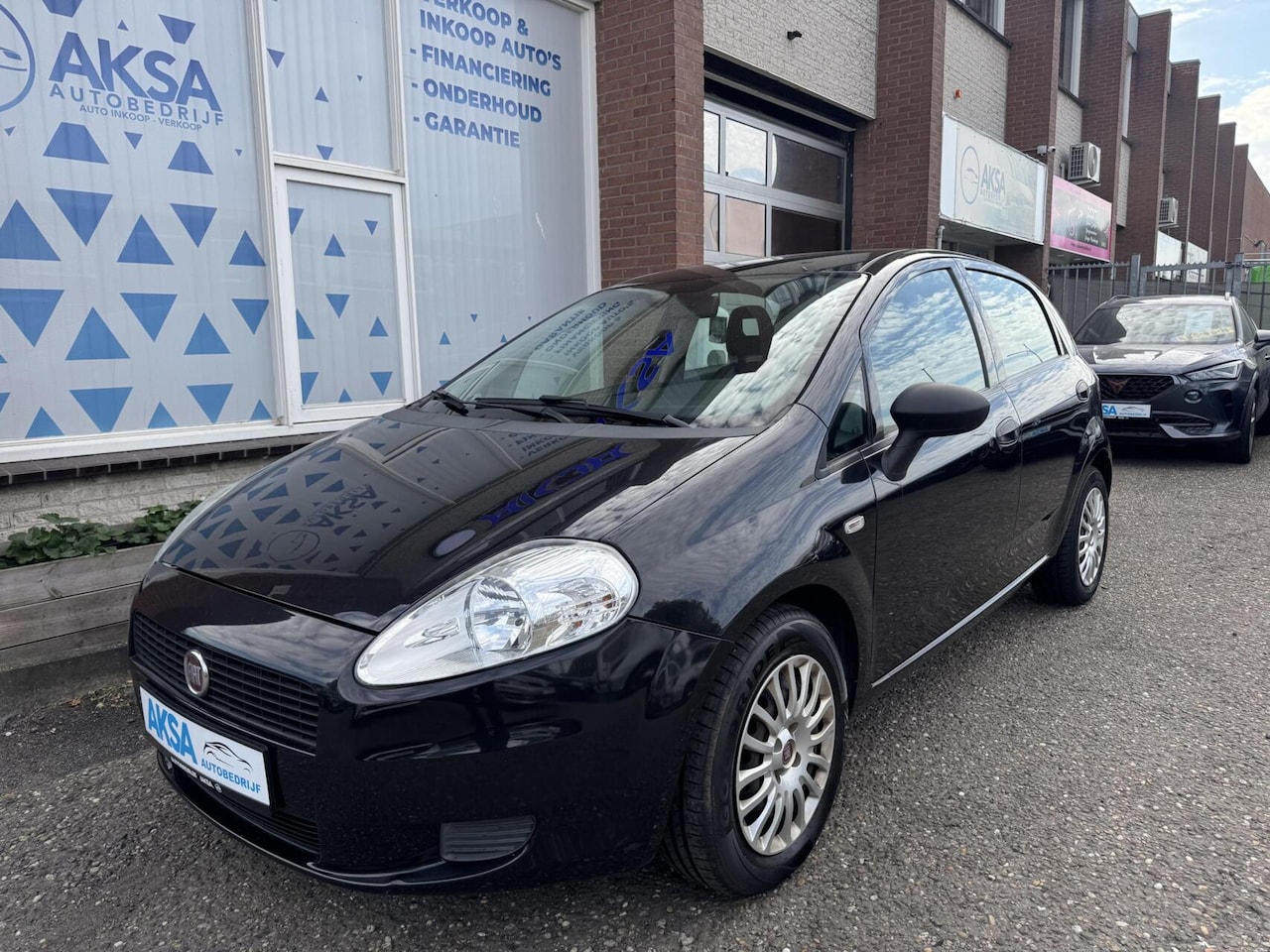 Fiat Grande Punto - 1.3 M-Jet Actual Navigatie Carplay Airco Elektr ramen - AutoWereld.nl