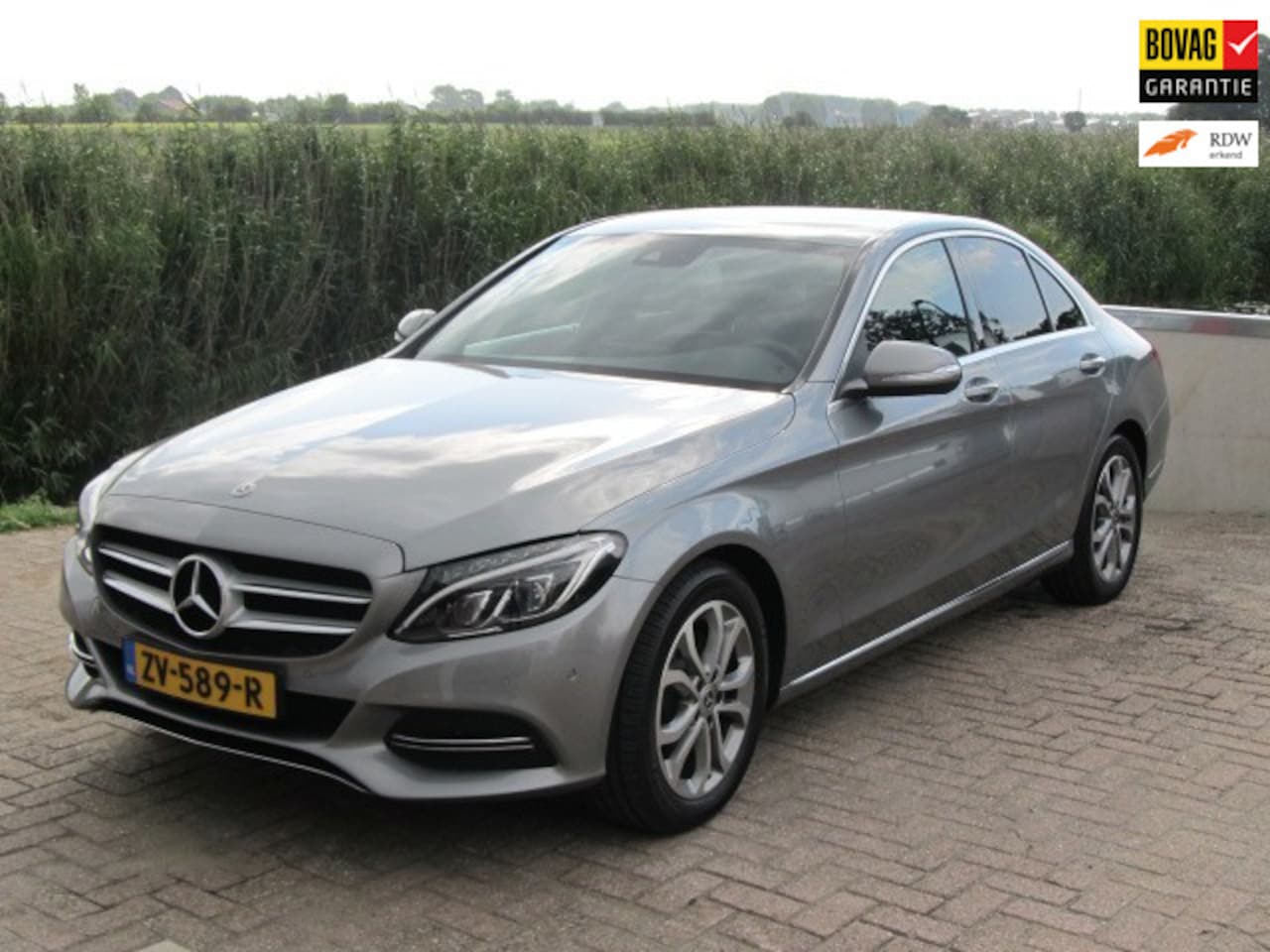 Mercedes-Benz C-klasse - 180 Prestige Automaat/Burmester+/Navigatie - AutoWereld.nl