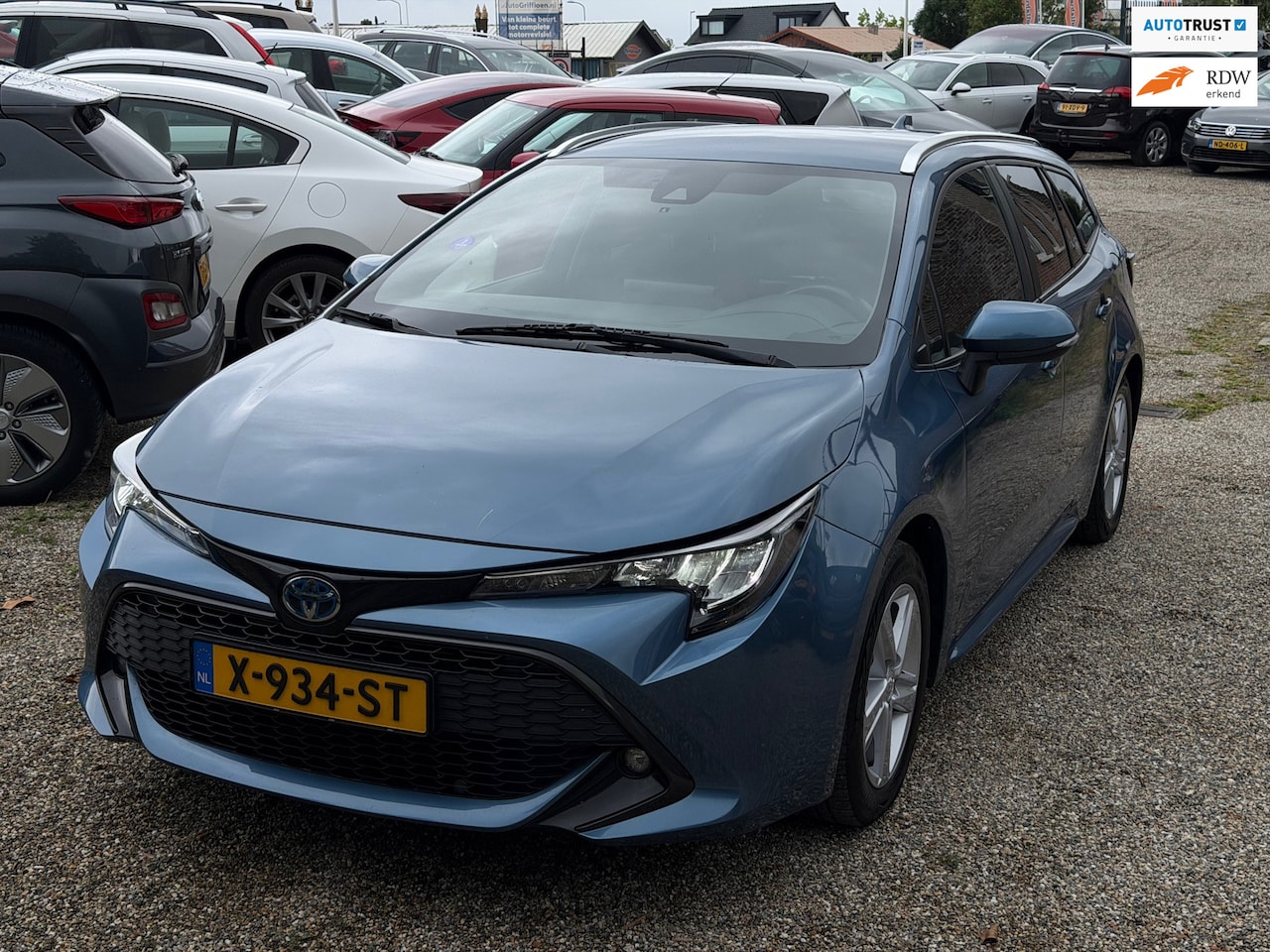 Toyota Corolla Touring Sports - 1.8 Hybrid Active Keyless Camera BTW Auto Dealer Onderhouden Winterbanden Adaptief Cruise - AutoWereld.nl