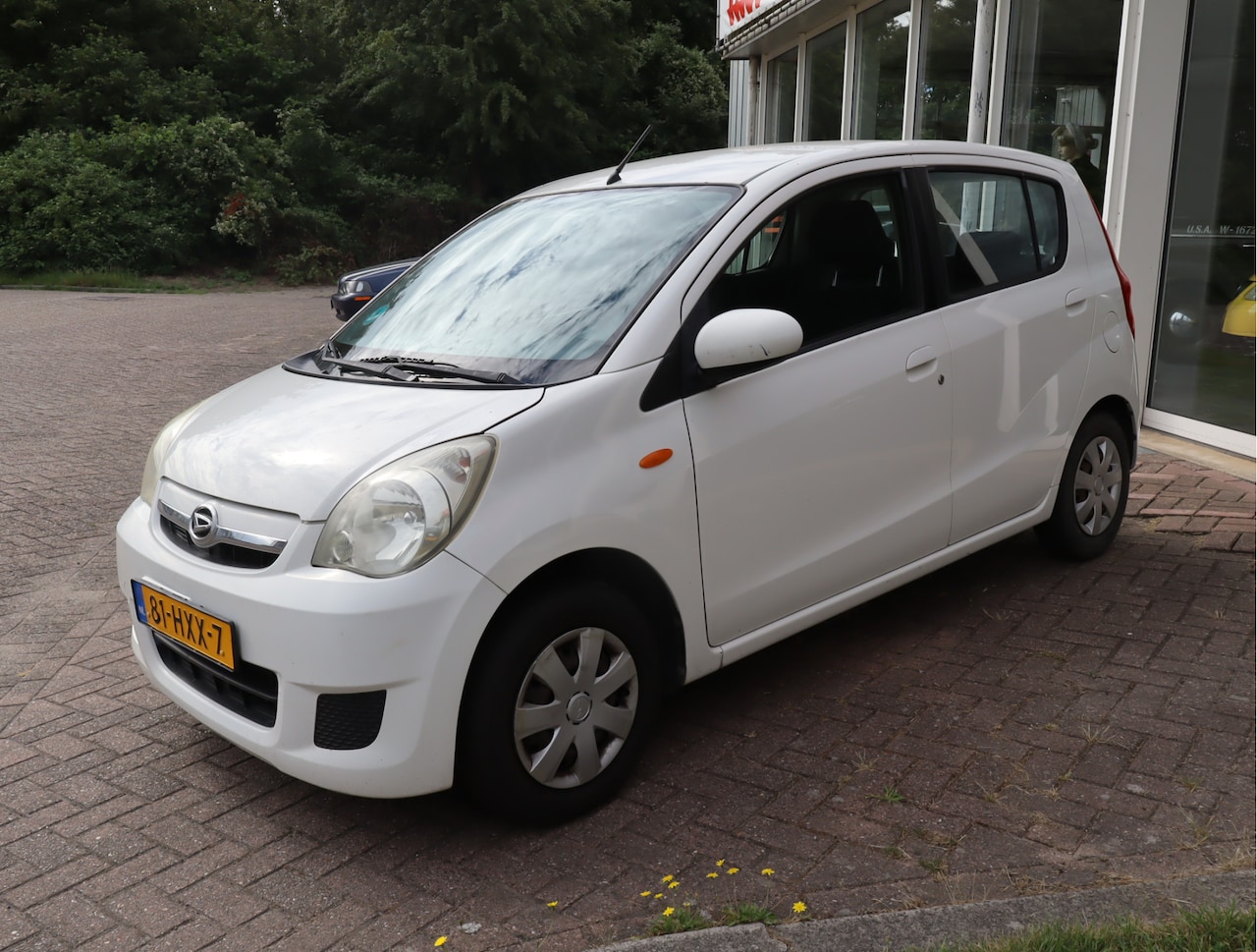 Daihatsu Cuore - 1.0 Premium Kan direct mee! Airco! APK Juli 2027! - AutoWereld.nl