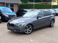 BMW 1-serie - 114i Upgrade Edition Sport|Nieuwe Ketting + Klepseals|Carplay|Xenon|Leder|Climate control|