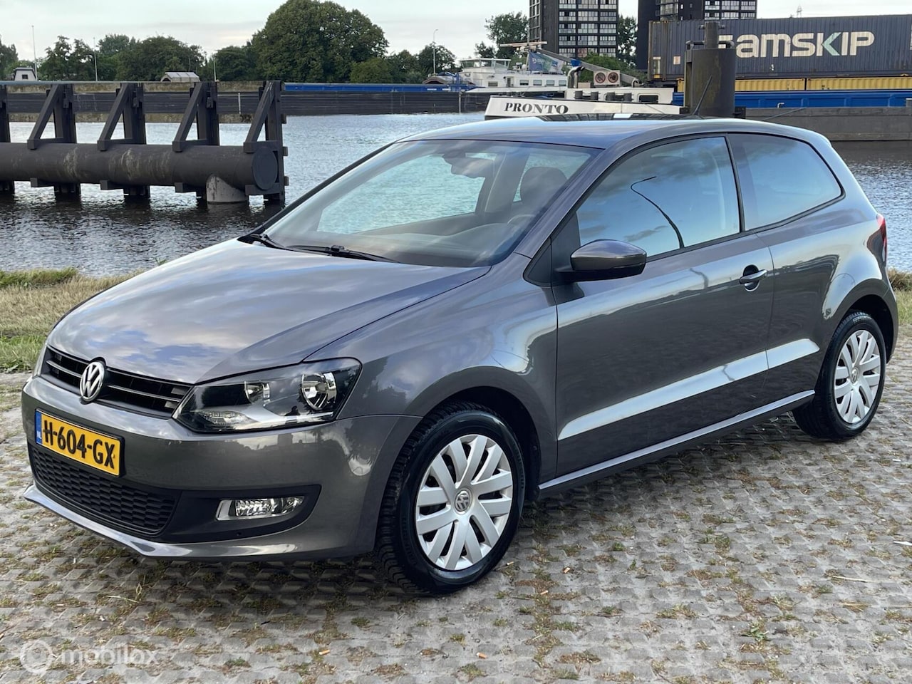Volkswagen Polo - 1.4-16V Highline DSG Airco Cruise Stoelverwarming - AutoWereld.nl