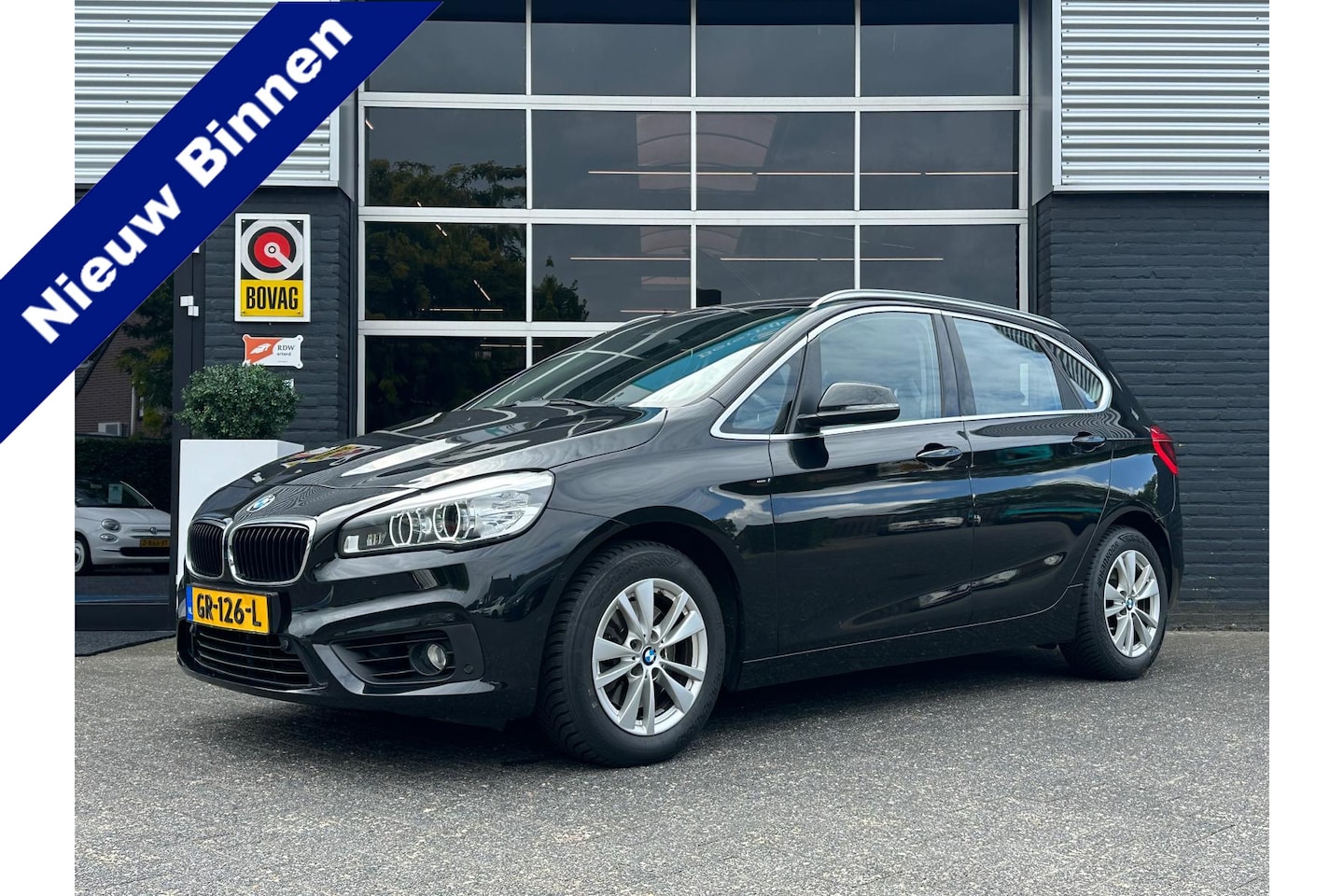 BMW 2-serie Active Tourer - 218i Essential 218i Essential, Automaat, Bluetooth, Cruise, Navi, Trekhaak, PDC, NAP - AutoWereld.nl