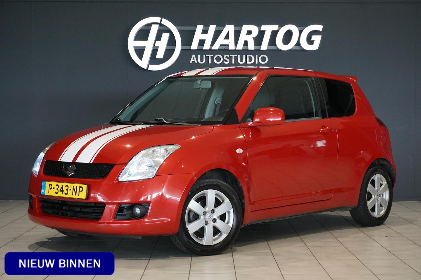 Suzuki Swift - 1.3 Limited Sport + KEYLESS / STOELVERWARMIMG / CLIMATE CONTROL - AutoWereld.nl