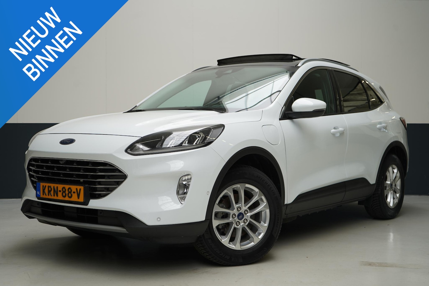 Ford Kuga - 2.5 PHEV Titanium | SoH 75% | Panoramadak | Trekhaak | Carplay | Blind-Spot | Winter-pack - AutoWereld.nl