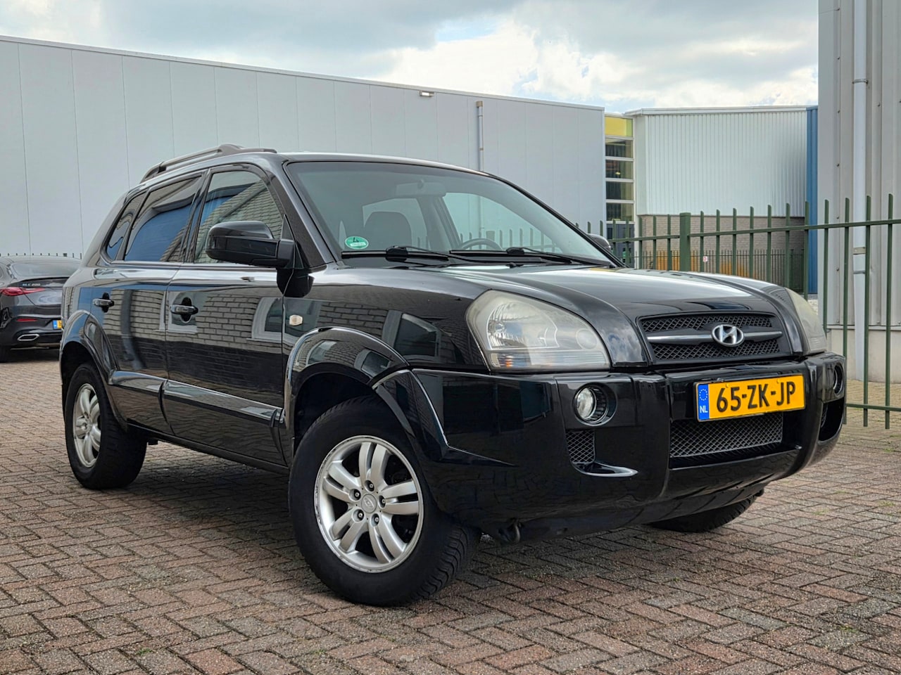 Hyundai Tucson - 2.0i Dynamic Airco-Leder-Pdc-Stoelverwarming - AutoWereld.nl