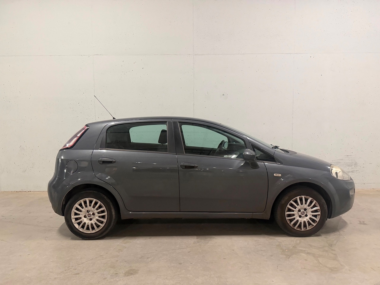 Fiat Punto Evo - 1.2 5drs. Airco APK NAP - AutoWereld.nl
