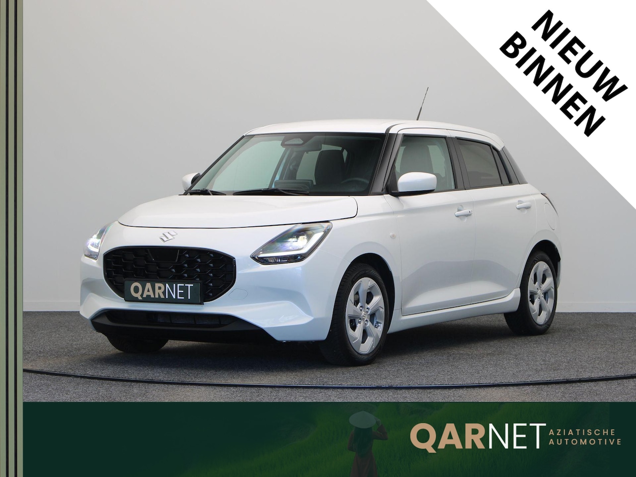 Suzuki Swift - 1.2 Comfort Smart Hybrid | Stoelverwarming | Achteruitrijcamera | Cruise Control Adaptief - AutoWereld.nl