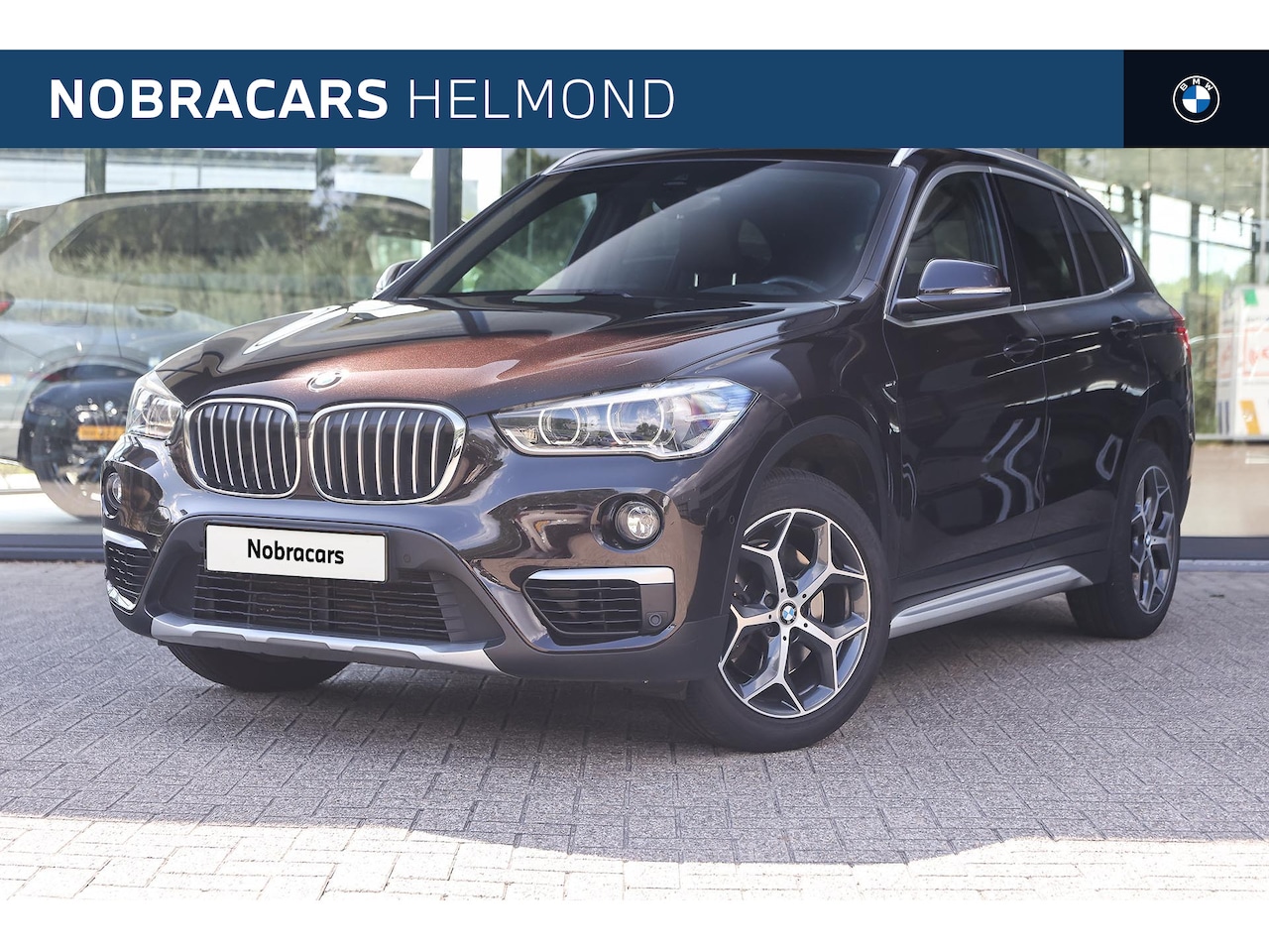 BMW X1 - sDrive20i High Executive xLine Automaat / Trekhaak / Sportstoelen / Head-Up / Achteruitri - AutoWereld.nl