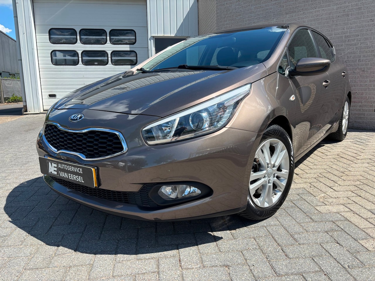 Kia Cee'd - 1.4 CVVT AIRCO/4 SEIZOENEN BAND/PARROT. - AutoWereld.nl