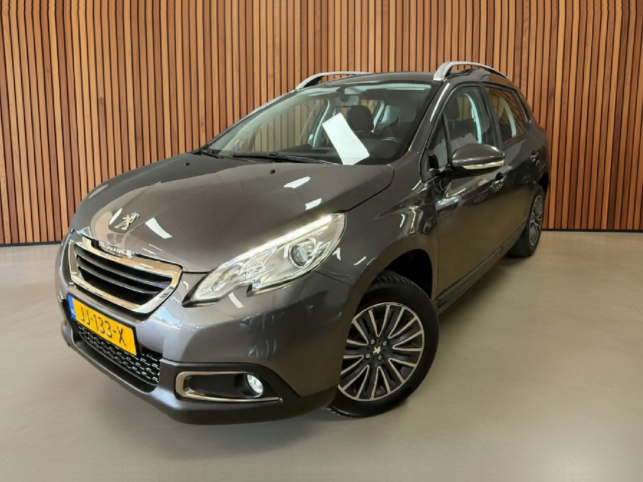 Peugeot 2008 - 1.2 PureTech Blue Lion | Navi | Sensoren | Trekhaak - AutoWereld.nl