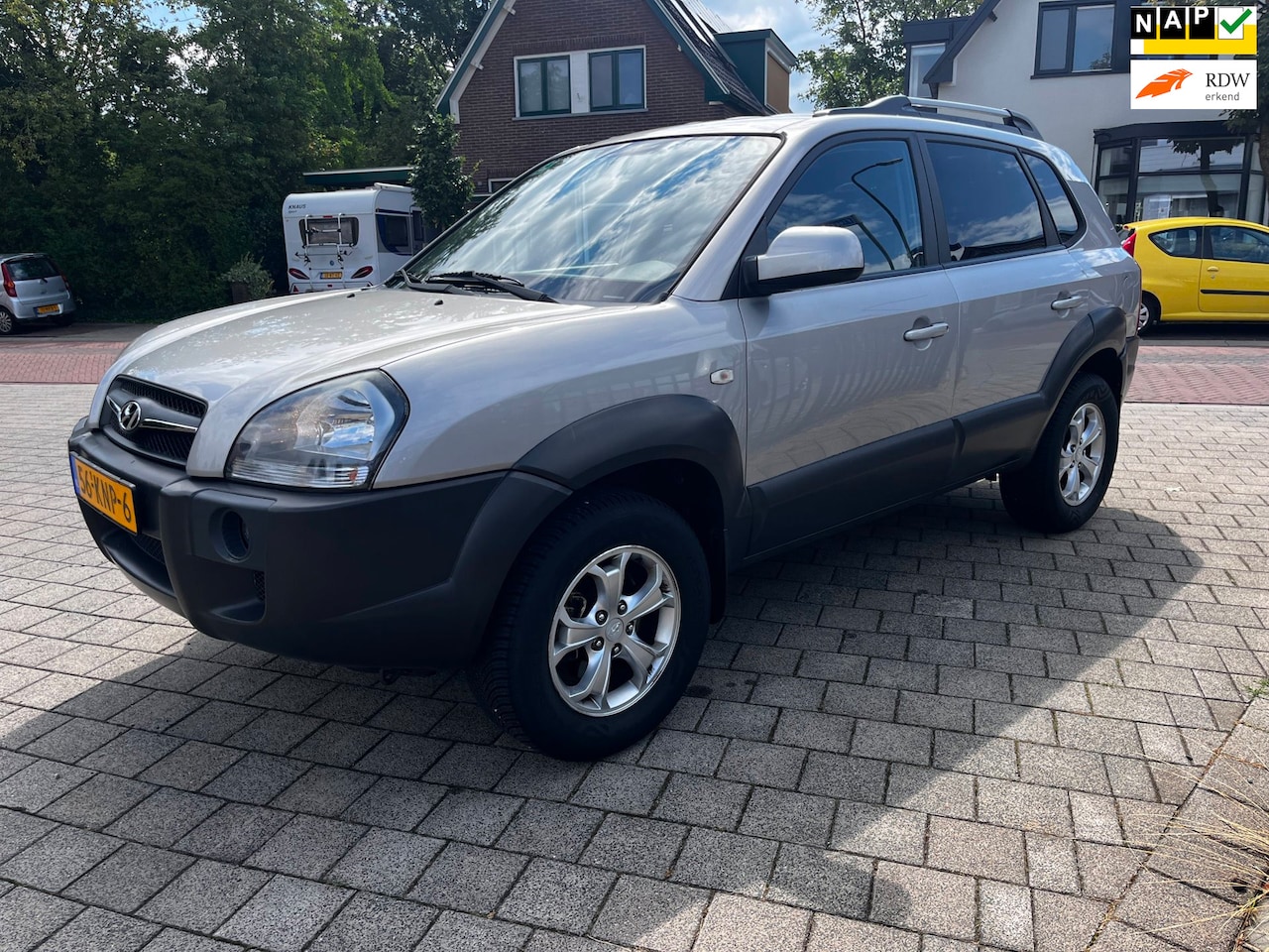 Hyundai Tucson - 2.0i Style Ecc Trekh Cruise LM Isofix APK 141PK - AutoWereld.nl