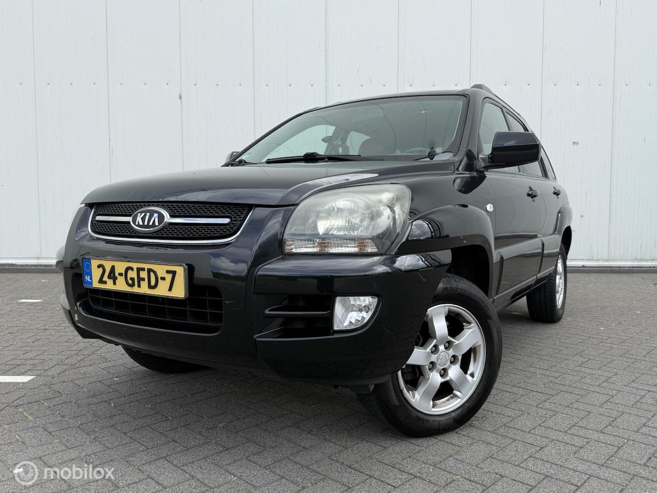 Kia Sportage - 2.0 X-ception Airco Trekhaak Stoelverwarming - AutoWereld.nl