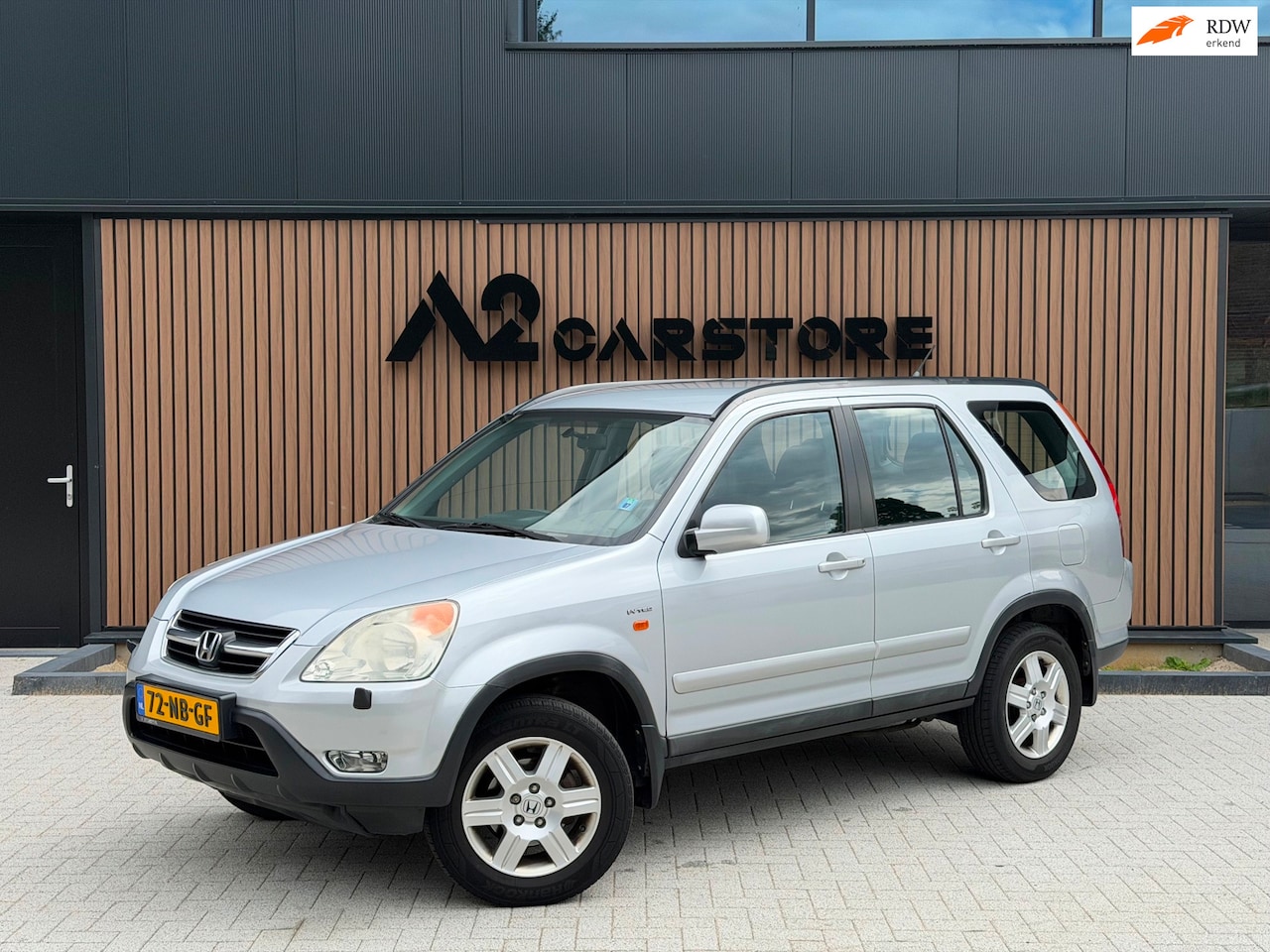 Honda CR-V - 2.0i ES NAP APK AIRCO Leer 4X4 - AutoWereld.nl