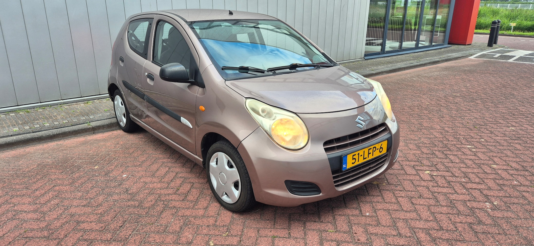 Suzuki Alto - 1.0 Comfort Plus AIRCO ☆ 5DRS ☆ ELEKTR. RAMEN ☆ AFST.BED. CENTRALE DEURVERGRENDELING ☆ ETC. - AutoWereld.nl