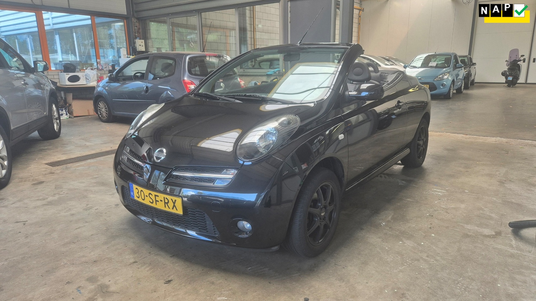 Nissan Micra C+C - 1.6 Tekna Plus Met Nieuwe Apk 140391 Km. - AutoWereld.nl