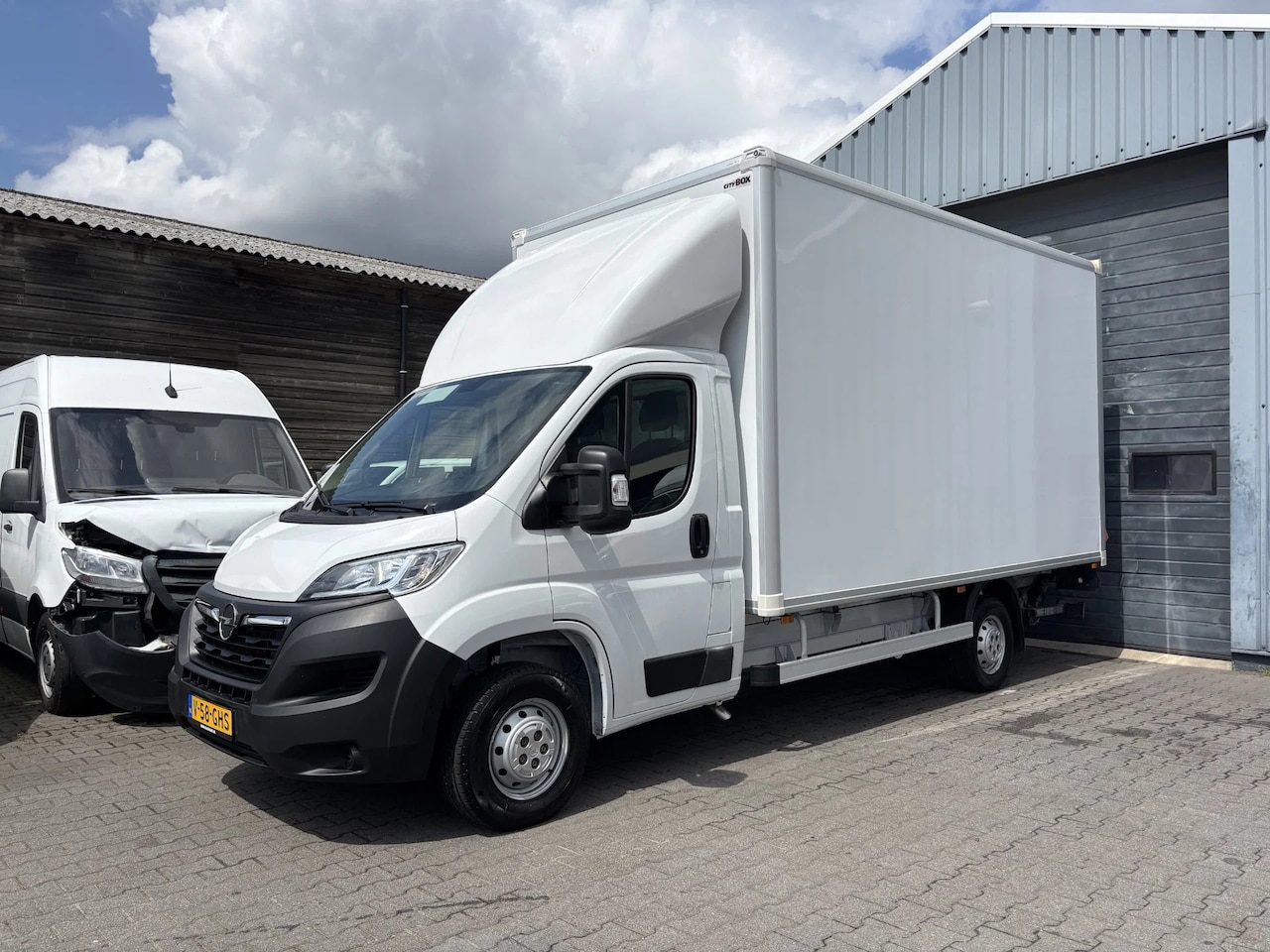 Opel Movano - 2.2D 140 PK Airco Cruisecontrol Camera Navi - AutoWereld.nl