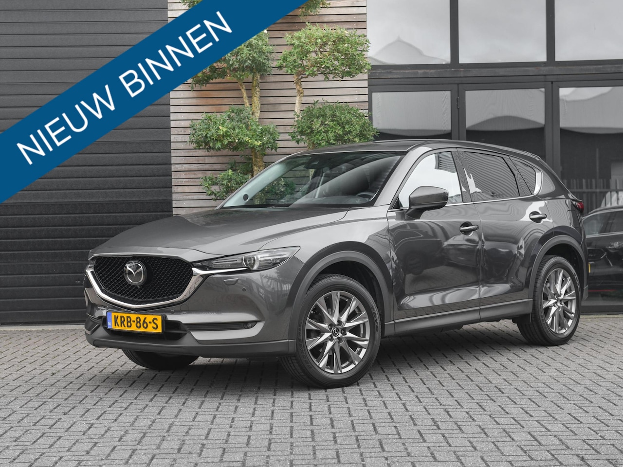 Mazda CX-5 - 2.0 SkyActiv-G 165 Luxury Leren bekleding Adaptive cruise control Navi Clima Camera Bose - AutoWereld.nl
