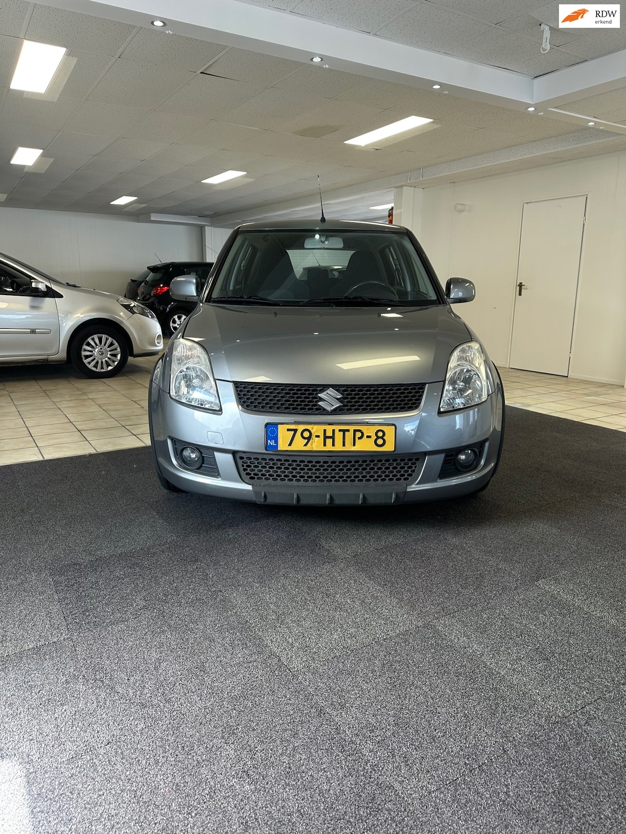 Suzuki Swift - 1.3 Bandit. NAP , Airco - AutoWereld.nl