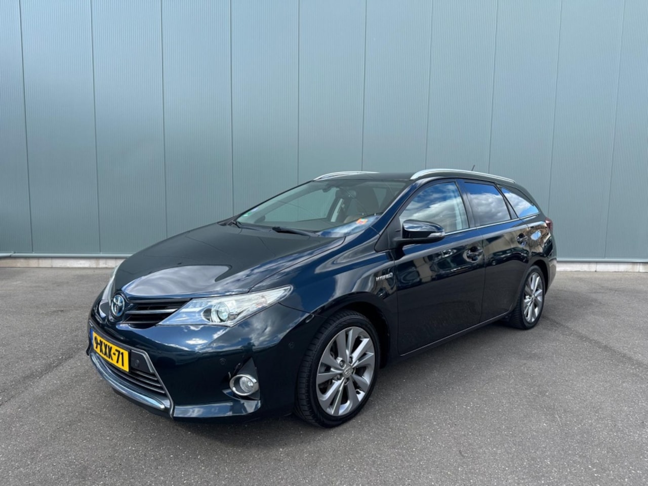 Toyota Auris Touring Sports - 1.8 Hybr. Executive LEDER | TREKHAAK | CAMERA ! - AutoWereld.nl