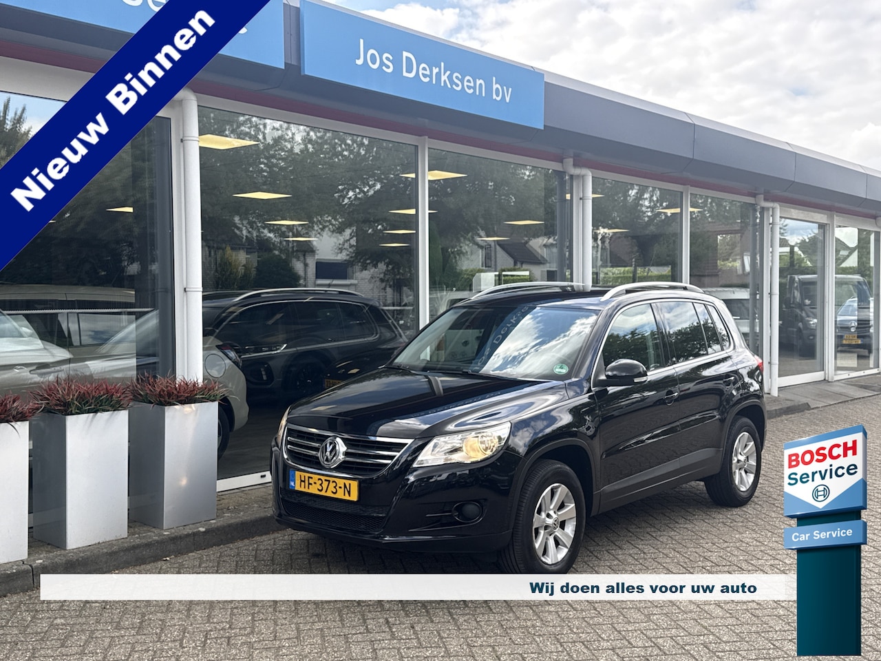 Volkswagen Tiguan - 1.4 TSI 90 kW Sport & Style BMT - Climatronic | Trekhaak - AutoWereld.nl