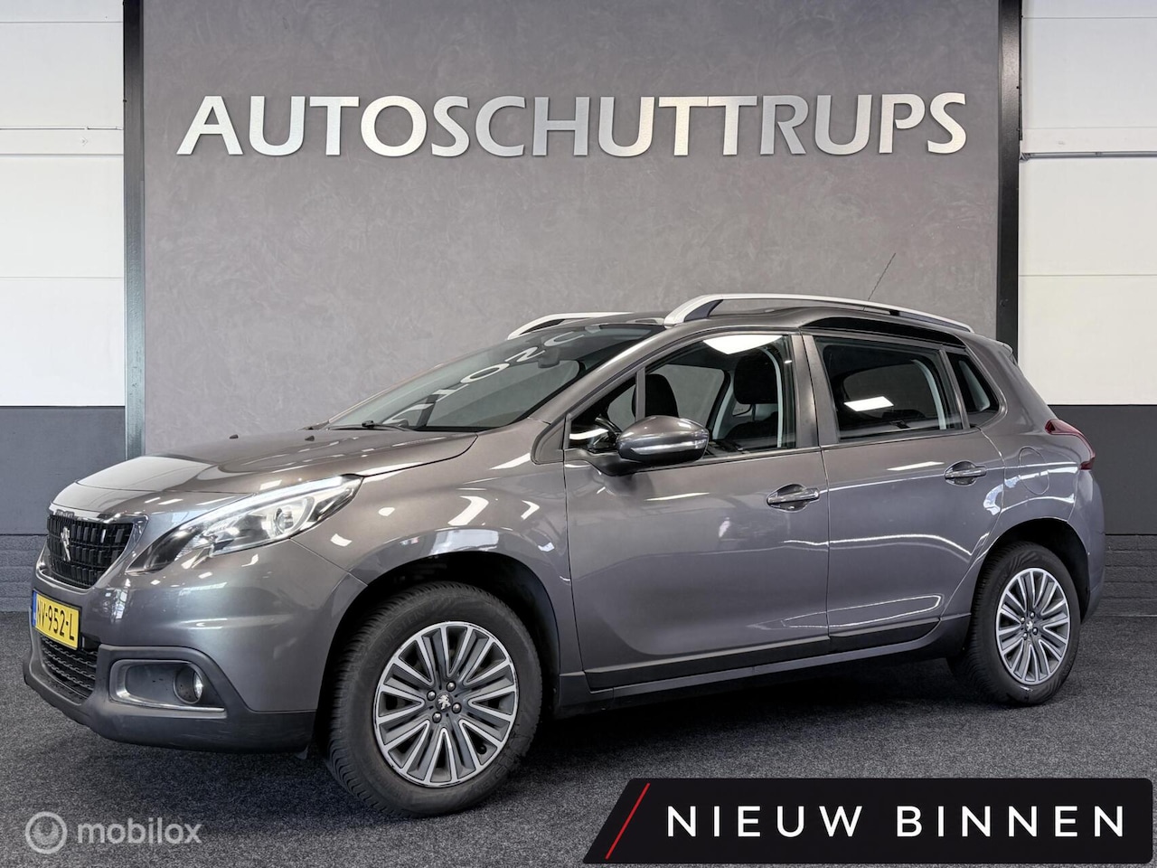 Peugeot 2008 - 1.2 PureTech CARPLAY / NAVIGATIE / AIRCO / CRUISE / NAP - AutoWereld.nl