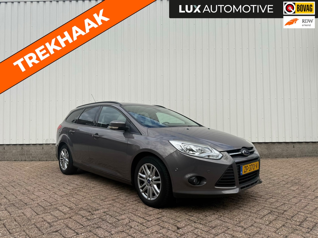 Ford Focus Wagon - 1.6 EcoBoost Lease Titanium 1.6 EcoBoost Lease Titanium, Trekhaak 1.500kg, 4 seizoenenbanden, PDC - AutoWereld.nl