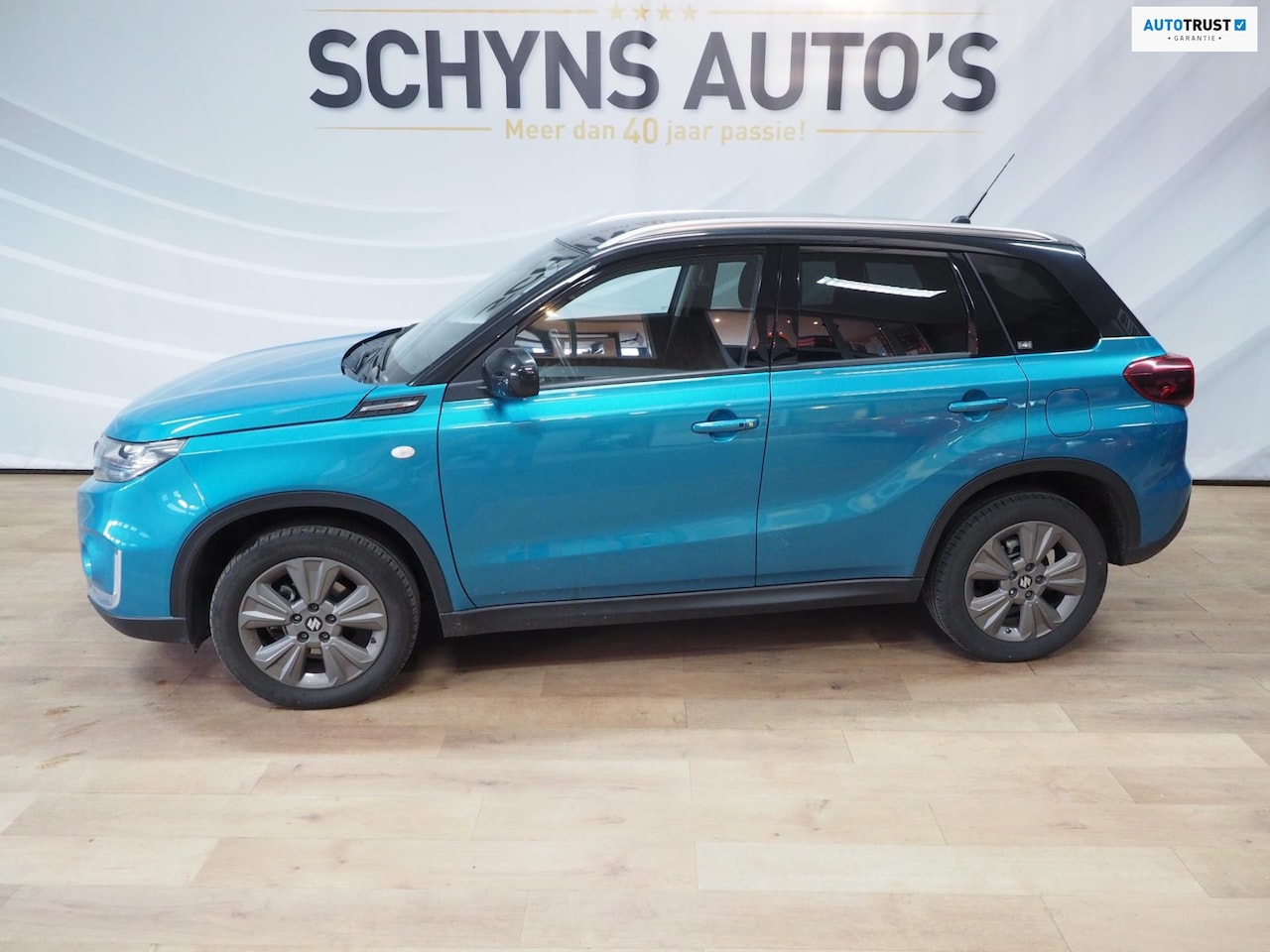 Suzuki Vitara - 1.5 Hybride Style AllGrip Automaat GEEN bijkomende kosten - AutoWereld.nl