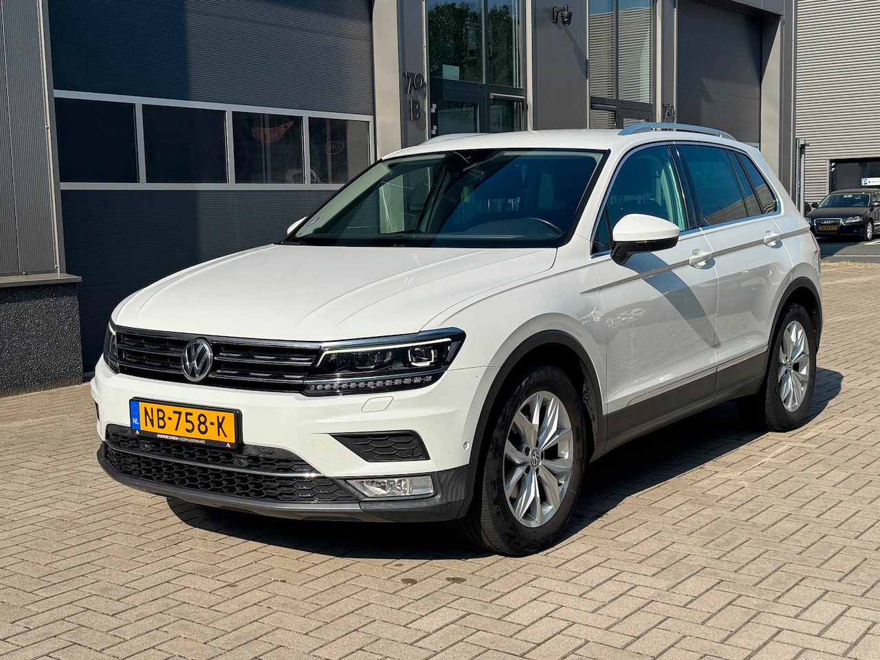 Volkswagen Tiguan - 1.4 TSI ACT Highline 1.4 TSI ACT Highline - AutoWereld.nl