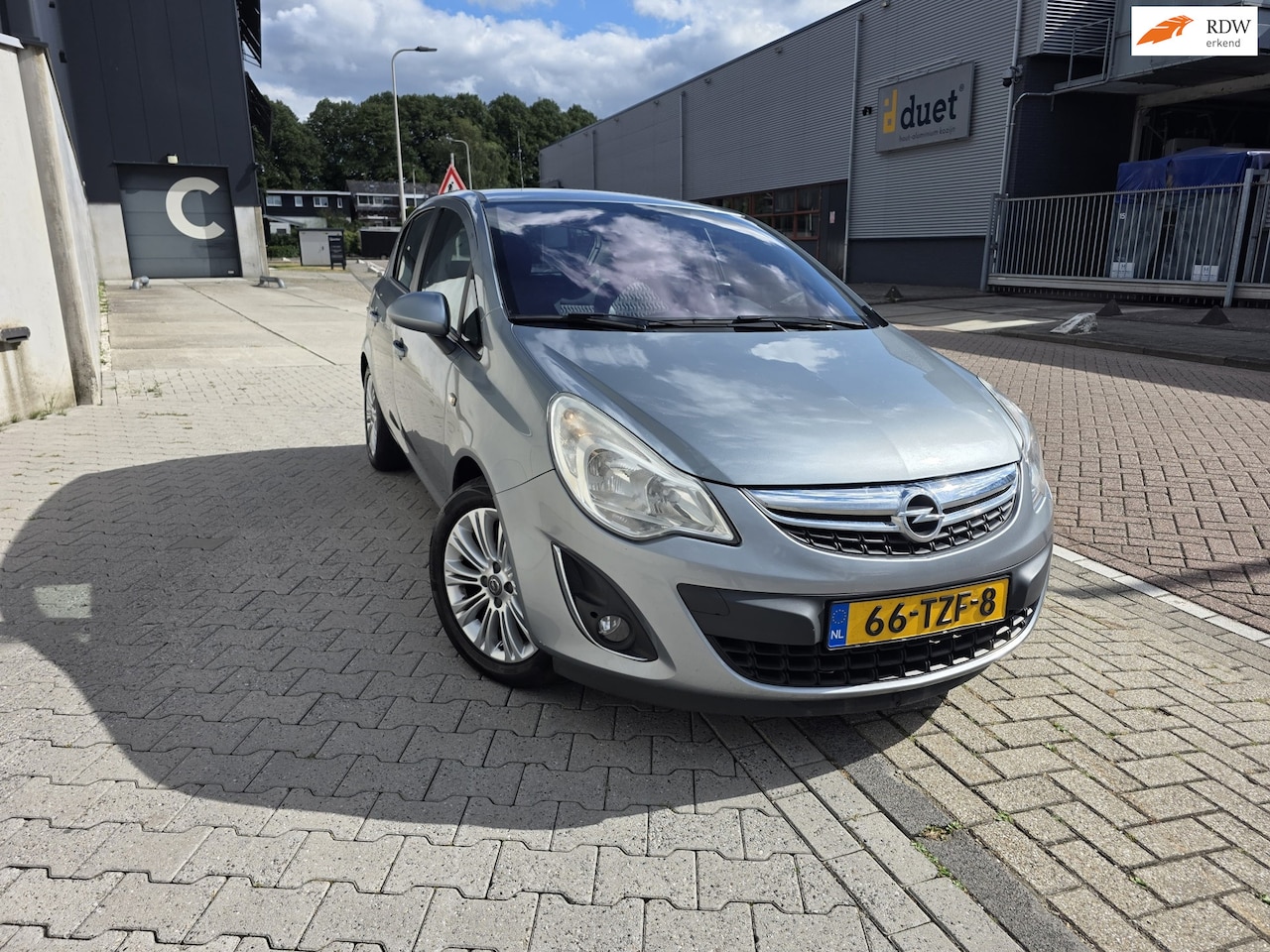 Opel Corsa - 1.2-16V Cosmo NAVI Half Leer PDC Volledig onderhouden - AutoWereld.nl