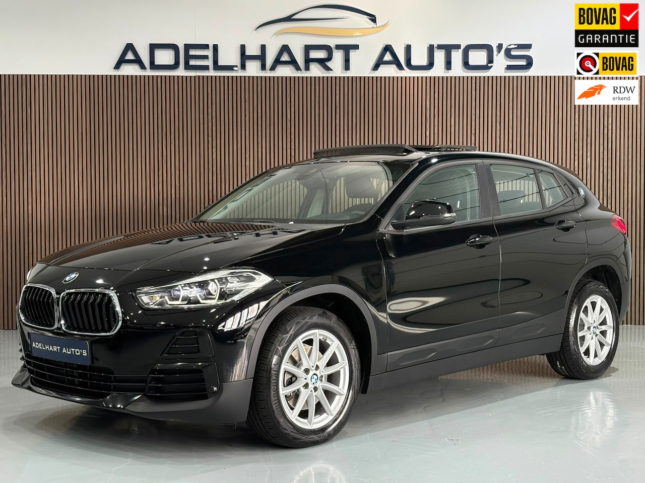 BMW X2 - SDrive18i Business X Line Automaat / Panorama dak / Climate control / Parkeer sensoren - AutoWereld.nl