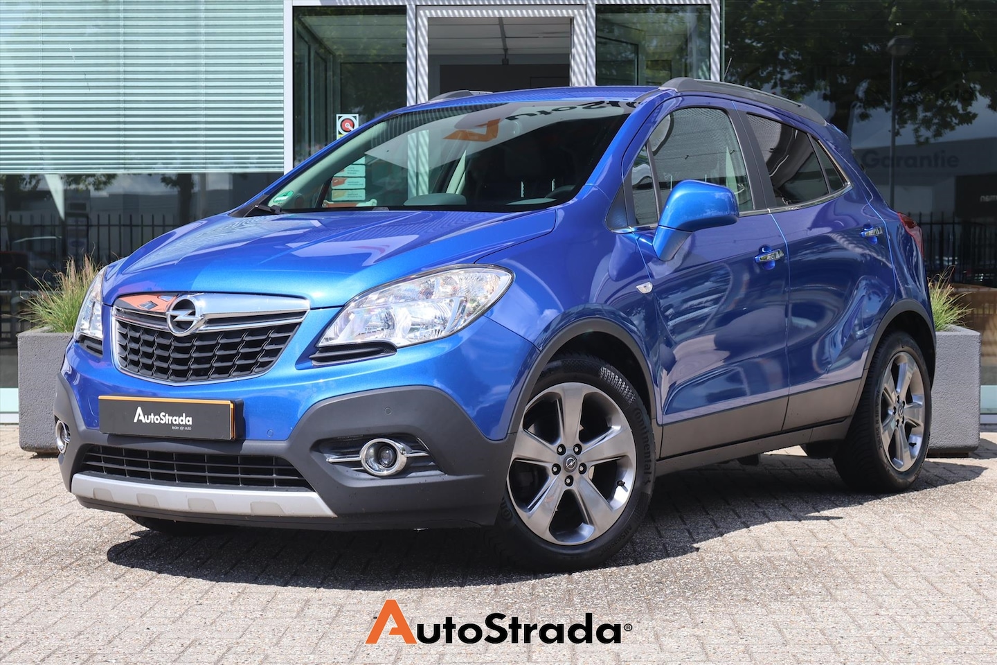 Opel Mokka - 1.4 TURBO Cosmo 140PK I Leder I Camera I Navi I Trekhaak I Stuur/Stoelverwarming - AutoWereld.nl