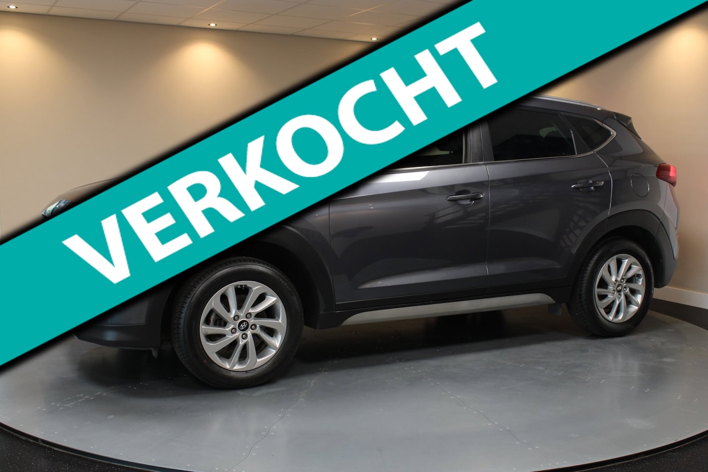 Hyundai Tucson - 1.6 GDi Comfort *Trekhaak* Stoelverw. V+A|Navi|Camera|Cruise - AutoWereld.nl