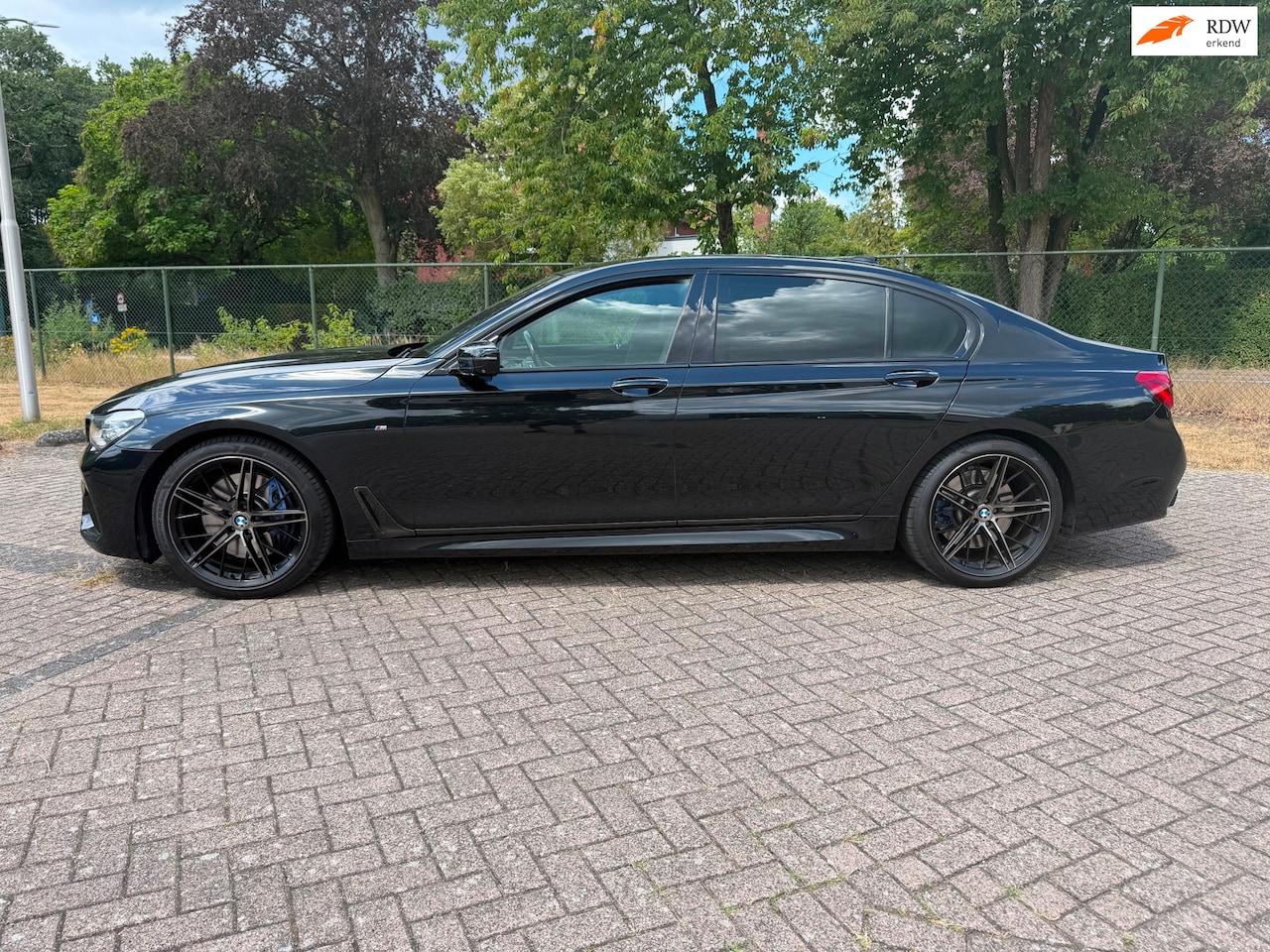 BMW 7-serie - 750Li M Sport zwart zwart carbon zeer mooie auto! High executive - AutoWereld.nl