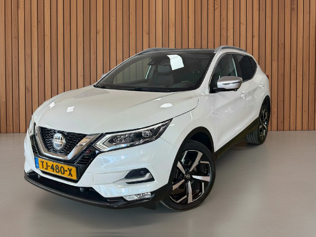 Nissan Qashqai - 1.2 Tekna + | 360 | Navigatie | Stoelverw. - AutoWereld.nl