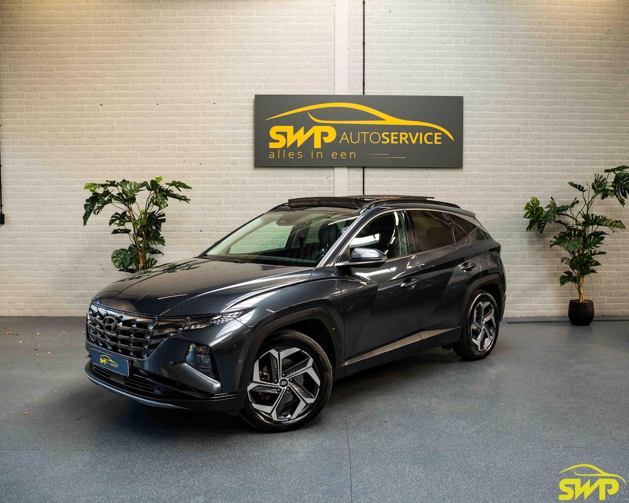 Hyundai Tucson - 1.6 T-GDI PHEV Premium Sky 4WD | Pano | Navi | 360 cam | Stoel ventilatie | Navi - AutoWereld.nl